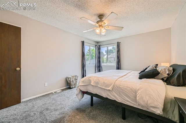 4652 Excalibur Ct, Colorado Springs, CO 80917 - bedroom featuring carpet floors, a textured ceiling, and ceiling fan