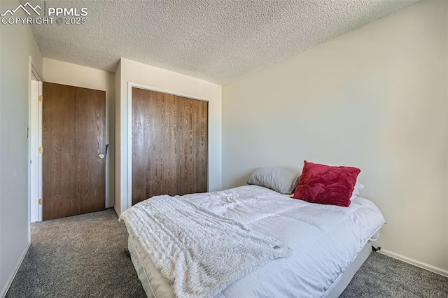 4652 Excalibur Ct, Colorado Springs, CO 80917 - bedroom featuring carpet, a textured ceiling, and a closet