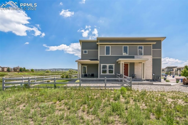 1842 Peak Prairie Ln, Monument, CO 80132 - back of house featuring a patio area and a fenced backyard