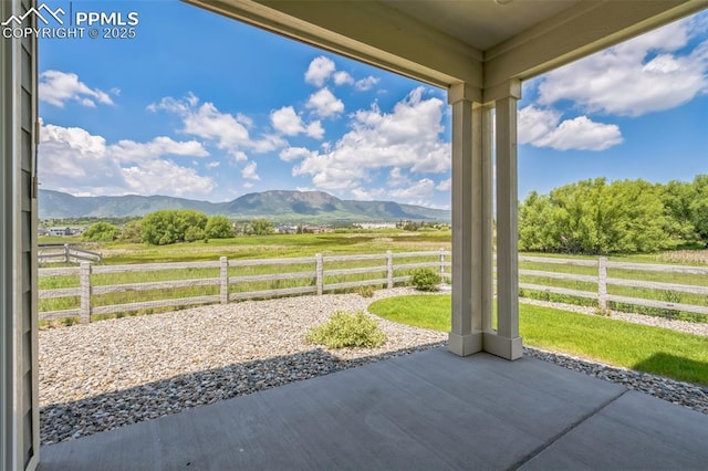 1842 Peak Prairie Ln, Monument, CO 80132 - view of patio / terrace featuring a mountain view and a view of rural / pastoral area