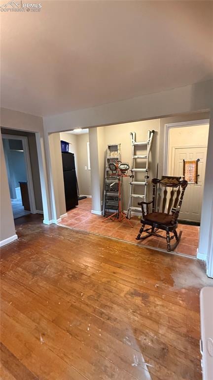 5030 Beach Ct, Denver, CO 80221 - living area featuring wood-type flooring and baseboards