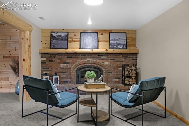 3512 Chico Cir, Colorado Springs, CO 80918 - sitting room featuring wooden walls, carpet floors, and a fireplace