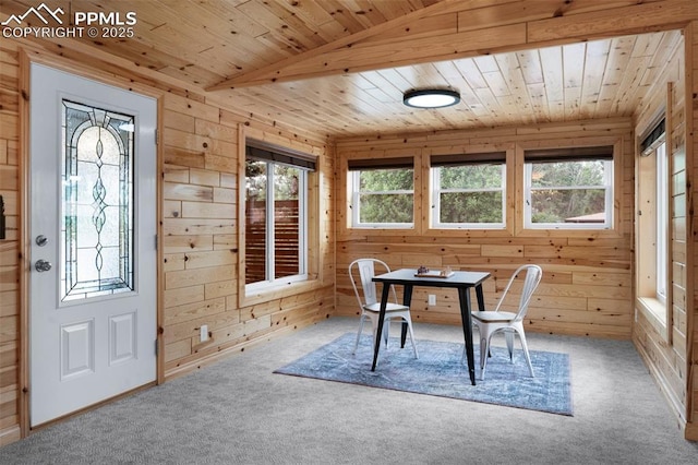 3512 Chico Cir, Colorado Springs, CO 80918 - dining room with wooden walls, carpet flooring, and wooden ceiling