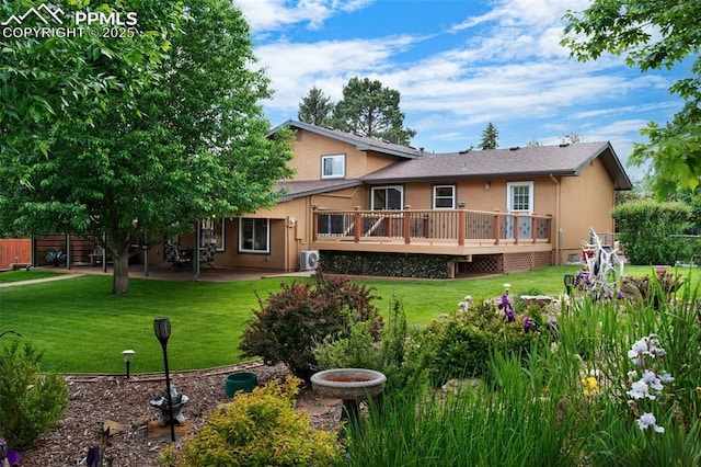 3512 Chico Cir, Colorado Springs, CO 80918 - back of property with stucco siding and a wooden deck