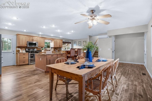 3512 Chico Cir, Colorado Springs, CO 80918 - dining area featuring wood finished floors, stairs, ceiling fan, and recessed lighting
