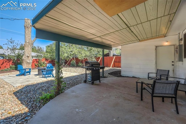 3622 Anemone Cir, Colorado Springs, CO 80918 - fenced backyard with a patio area, a grill, and electric panel