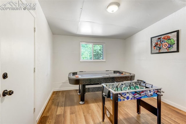 3622 Anemone Cir, Colorado Springs, CO 80918 - playroom with wood finished floors and baseboards