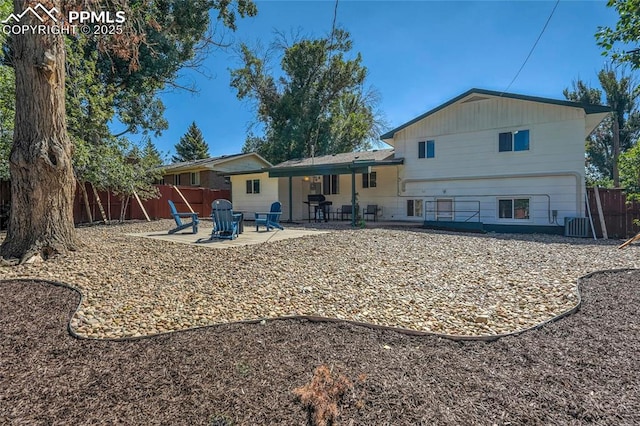 3622 Anemone Cir, Colorado Springs, CO 80918 - back of property with a patio area and central AC unit