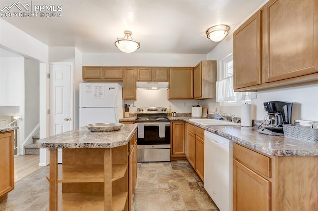 3622 Anemone Cir, Colorado Springs, CO 80918 - kitchen featuring white appliances, under cabinet range hood, a sink, open shelves, and a center island