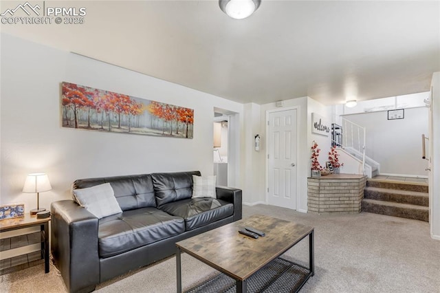 3622 Anemone Cir, Colorado Springs, CO 80918 - living room with stairs, carpet flooring, and baseboards