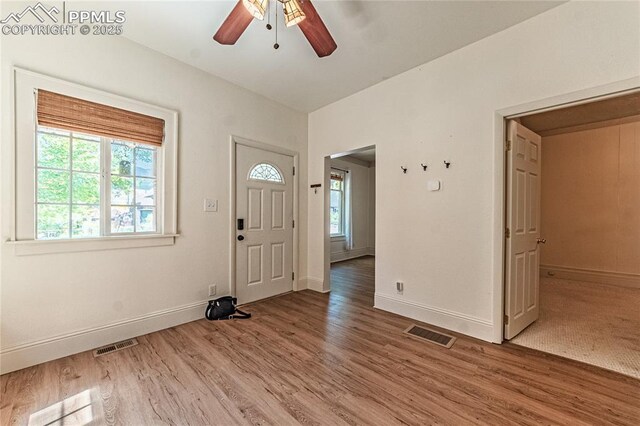 2830 W Kiowa St, Colorado Springs, CO 80904 - foyer entrance featuring healthy amount of natural light, wood finished floors, and ceiling fan