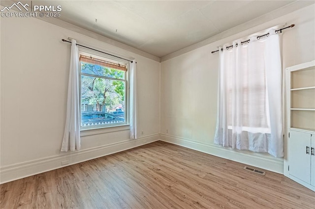 2830 W Kiowa St, Colorado Springs, CO 80904 - empty room featuring wood finished floors