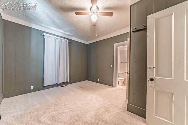 2830 W Kiowa St, Colorado Springs, CO 80904 - spare room with a ceiling fan and carpet flooring