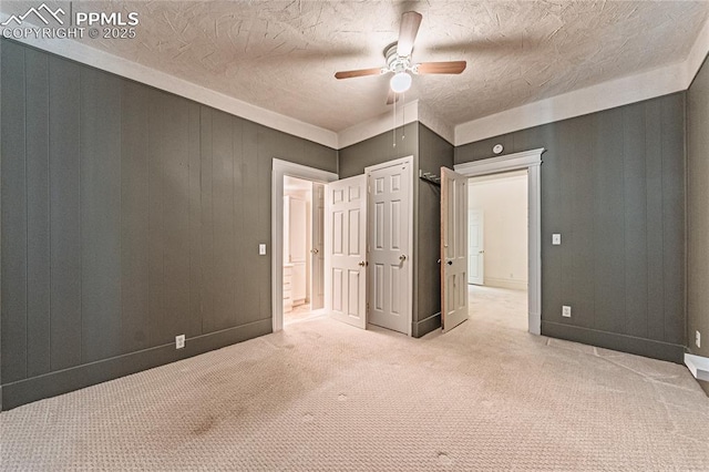 2830 W Kiowa St, Colorado Springs, CO 80904 - unfurnished bedroom with carpet, ceiling fan, and a textured ceiling