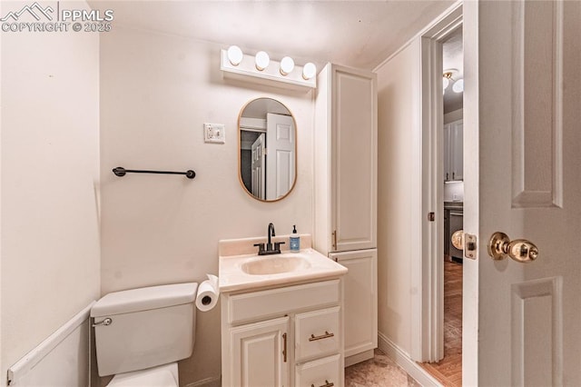 2830 W Kiowa St, Colorado Springs, CO 80904 - bathroom featuring vanity and toilet