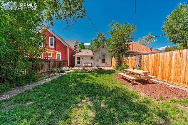 2830 W Kiowa St, Colorado Springs, CO 80904 - fenced backyard with a patio area