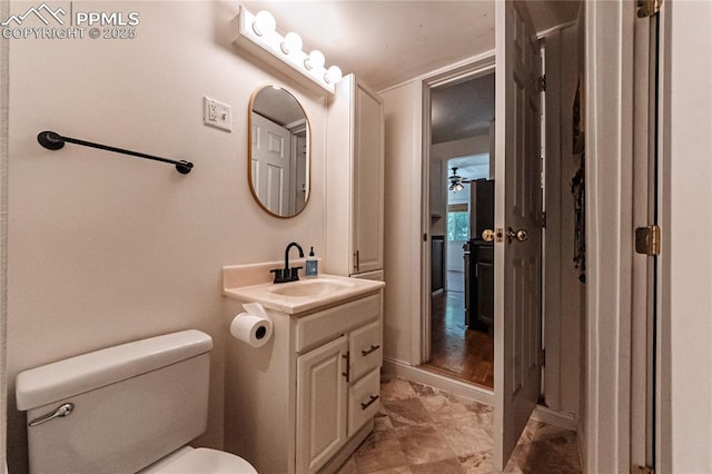 2830 W Kiowa St, Colorado Springs, CO 80904 - bathroom with vanity and a ceiling fan