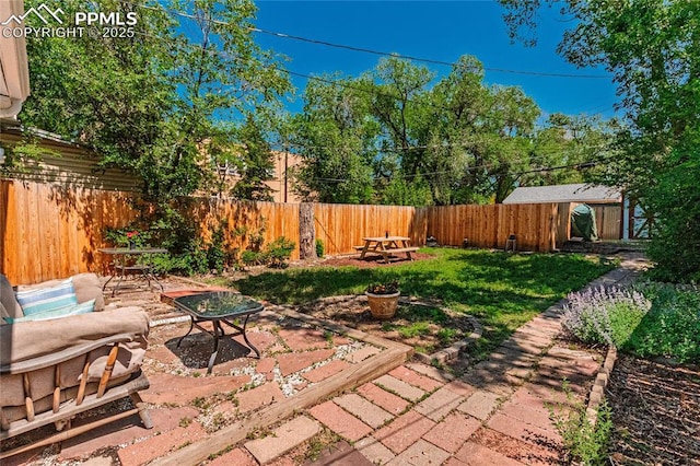 2830 W Kiowa St, Colorado Springs, CO 80904 - fenced backyard featuring a patio area