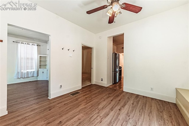 2830 W Kiowa St, Colorado Springs, CO 80904 - empty room featuring ceiling fan and wood finished floors