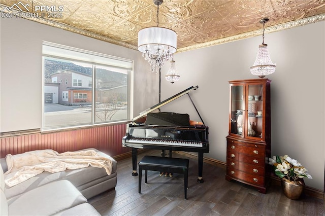 1124 E Poncha Ave, Salida, CO 81201 - sitting room with an ornate ceiling, a chandelier, and wood finished floors