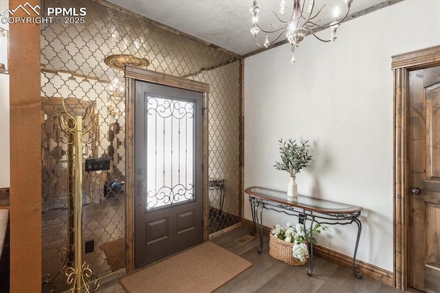 1124 E Poncha Ave, Salida, CO 81201 - entryway with a chandelier and wood finished floors