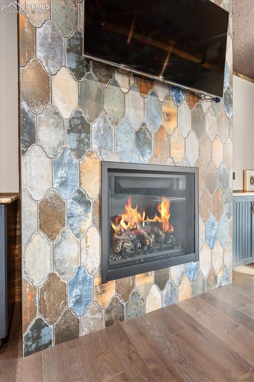 1124 E Poncha Ave, Salida, CO 81201 - detailed view of wood finished floors and a fireplace