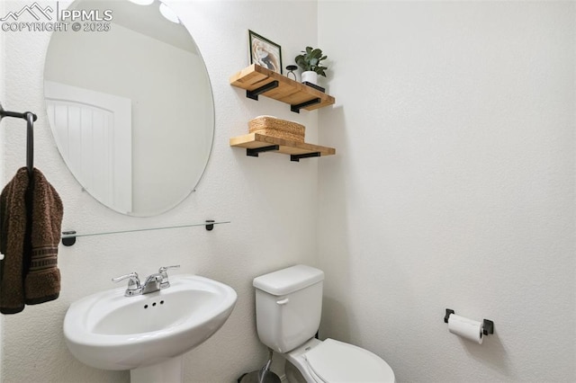 3748 Reindeer Cir, Colorado Springs, CO 80922 - bathroom with a sink and toilet