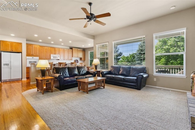 10290 Peach Blossom Trl, Colorado Springs, CO 80920 - living room with ceiling fan, recessed lighting, and light wood finished floors