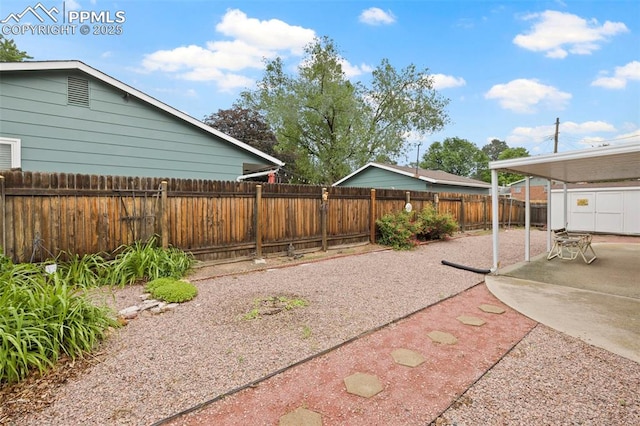2043 Patrician Way, Colorado Springs, CO 80909 - fenced backyard featuring a patio area