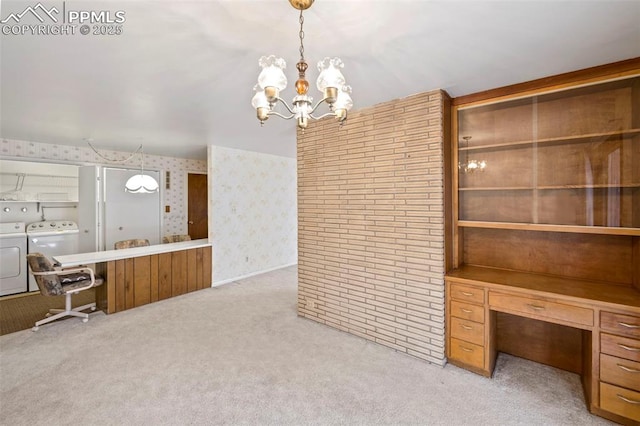 2043 Patrician Way, Colorado Springs, CO 80909 - dining space with independent washer and dryer, light colored carpet, a chandelier, wallpapered walls, and a desk