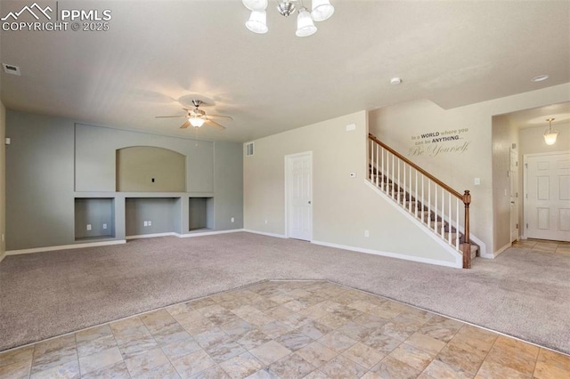2305 Reed Grass Way, Colorado Springs, CO 80915 - unfurnished living room with carpet flooring, stairway, and baseboards