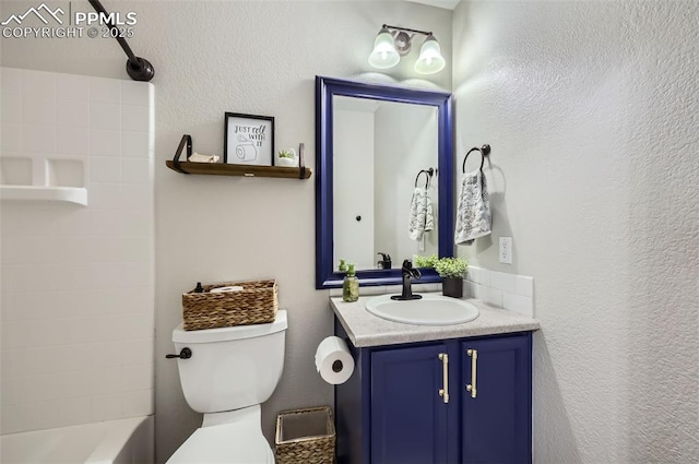 8084 Cinnamon Ct, Colorado Springs, CO 80927 - full bathroom featuring vanity, toilet, shower / bathtub combination, and a textured wall