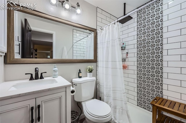 8084 Cinnamon Ct, Colorado Springs, CO 80927 - bathroom featuring vanity, shower / bath combo with shower curtain, and toilet