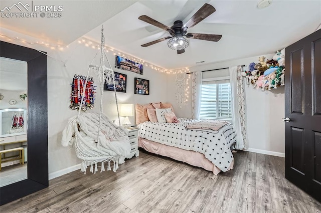 8084 Cinnamon Ct, Colorado Springs, CO 80927 - bedroom featuring baseboards, wood finished floors, and a ceiling fan