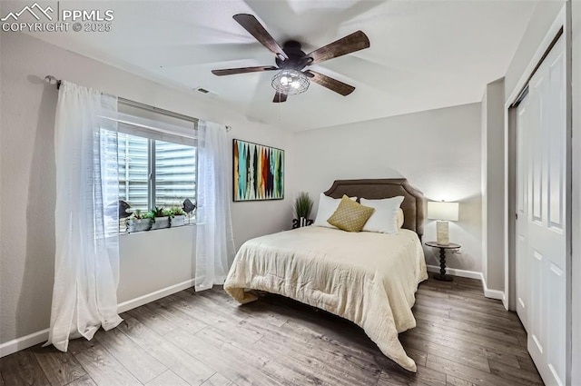 8084 Cinnamon Ct, Colorado Springs, CO 80927 - bedroom featuring a closet, wood finished floors, and baseboards