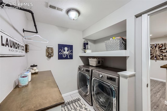 8084 Cinnamon Ct, Colorado Springs, CO 80927 - washroom featuring washing machine and clothes dryer and baseboards