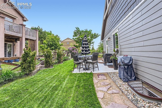 8084 Cinnamon Ct, Colorado Springs, CO 80927 - view of grassy yard featuring a patio area