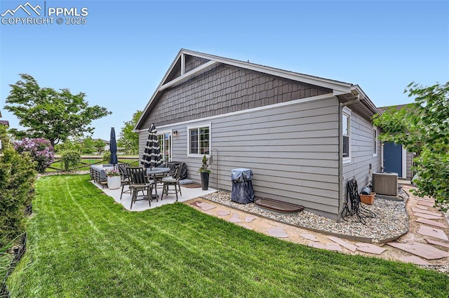 8084 Cinnamon Ct, Colorado Springs, CO 80927 - rear view of property with a patio area, a lawn, and cooling unit