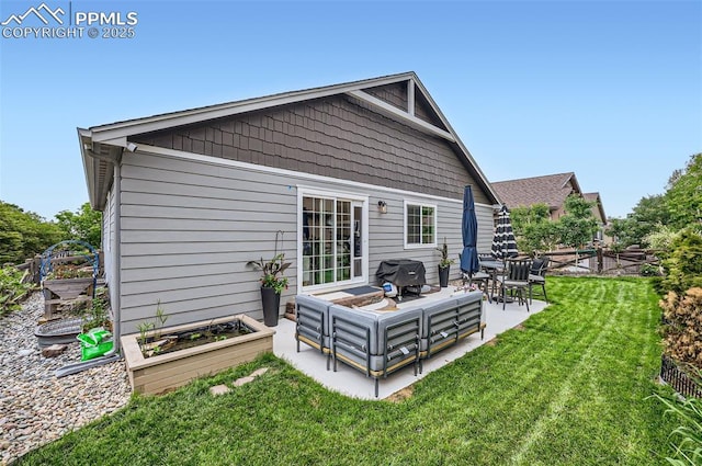 8084 Cinnamon Ct, Colorado Springs, CO 80927 - back of property with a patio area, a garden, and an outdoor living space