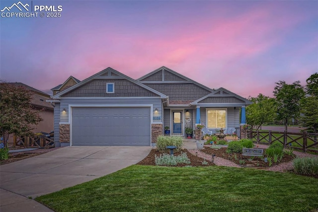 8084 Cinnamon Ct, Colorado Springs, CO 80927 - craftsman-style house with driveway and an attached garage