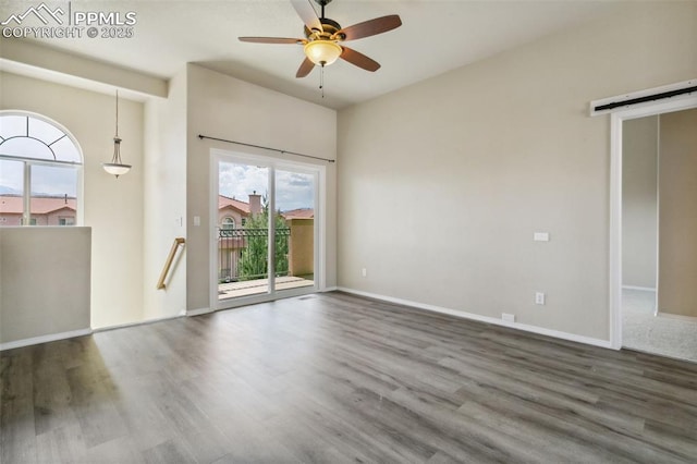 4710 Sand Mountain Pt, Colorado Springs, CO 80923 - spare room featuring wood finished floors and ceiling fan