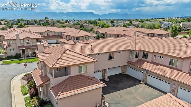 4710 Sand Mountain Pt, Colorado Springs, CO 80923 - aerial view of residential area with a mountainous background