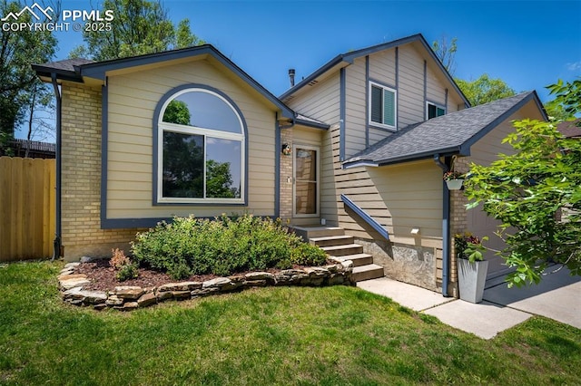 4125 Cricket Ct, Colorado Springs, CO 80918 - view of front of property featuring brick siding and a shingled roof