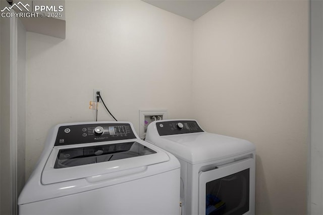 4125 Cricket Ct, Colorado Springs, CO 80918 - laundry room featuring washing machine and dryer