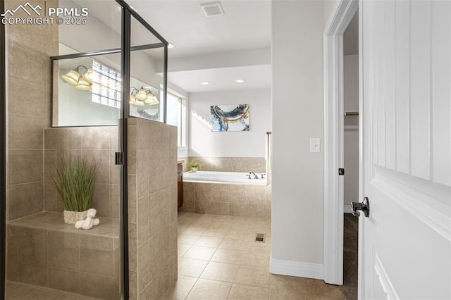 16255 Ridge Run Dr, Colorado Springs, CO 80908 - full bath featuring a garden tub, tile patterned floors, and a shower stall