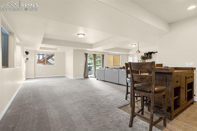 16255 Ridge Run Dr, Colorado Springs, CO 80908 - dining area featuring light colored carpet and a tray ceiling