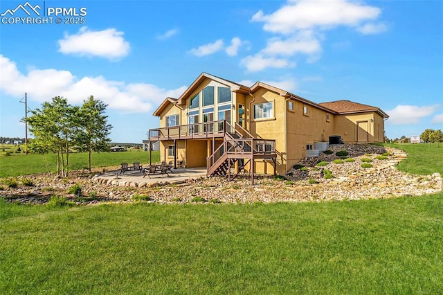 16255 Ridge Run Dr, Colorado Springs, CO 80908 - rear view of house with stairs, a patio, a wooden deck, a lawn, and stucco siding