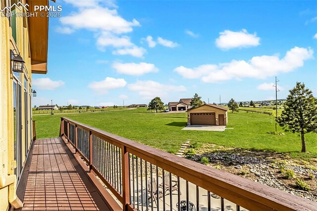 16255 Ridge Run Dr, Colorado Springs, CO 80908 - deck with an outbuilding, a yard, and a garage