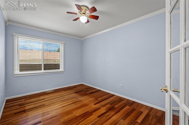206 Luxury Ln, Colorado Springs, CO 80921 - unfurnished room featuring wood finished floors, ornamental molding, and a ceiling fan