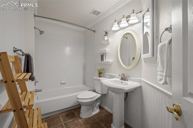 206 Luxury Ln, Colorado Springs, CO 80921 - bathroom with ornamental molding,  shower combination, and stone finish flooring